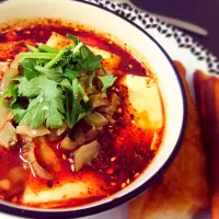 Spicy Tofu broth with fried bun|Elle Kongさん