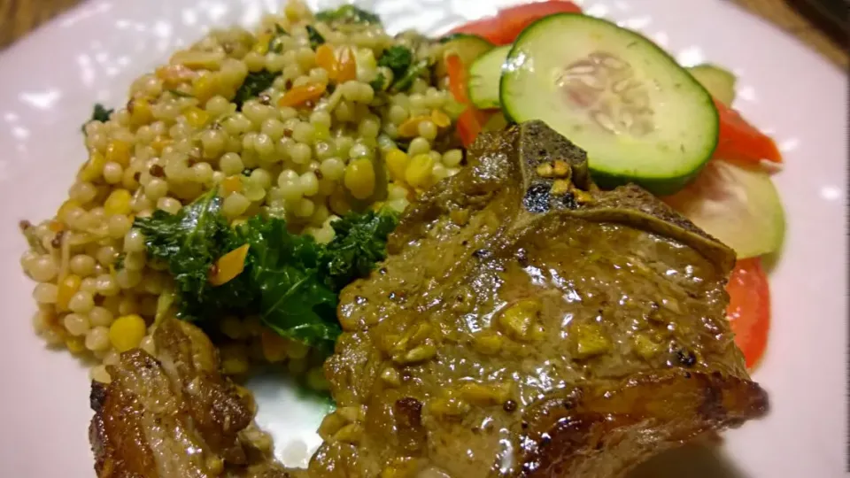 Lamb loin chop with sides of multi grains with vegetables & cucumber/tomato salad.|Jiraphon Gさん