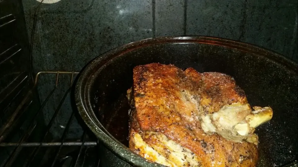 roast  pork sizzling away for dinner|Frank Ortizさん