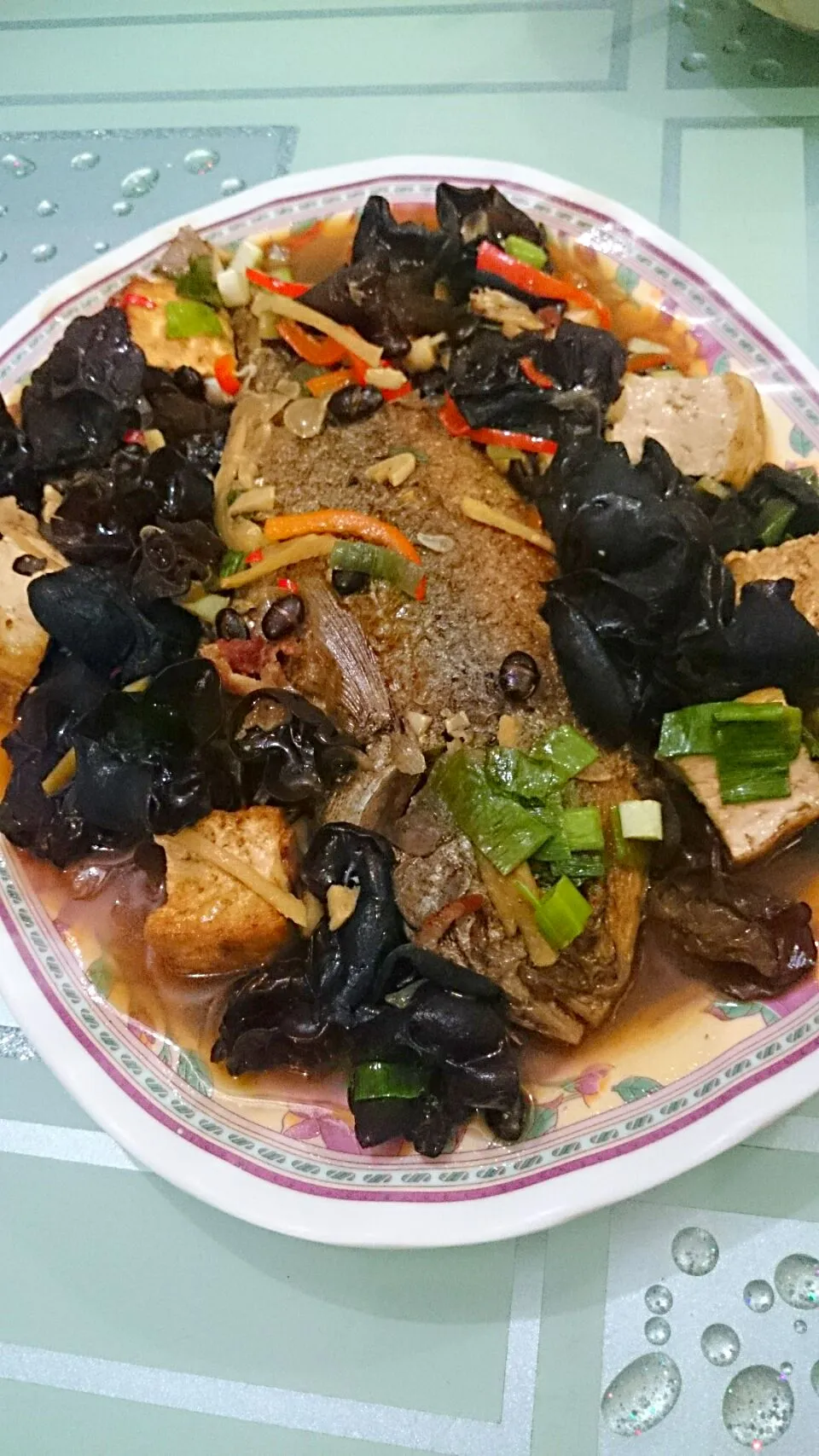 Fried Tofu and Fish then tossed and stir fry with black fungus,black bean,chillies,bell pepper, onion leaks,ginger,onion and garlic.|bonnieさん