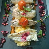 Pan fried whiting, risotto, confit cherry tomatoes, beetroot and pomegranate dressing.|lee mastinさん