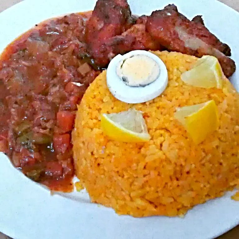 Snapdishの料理写真:wolof or jollof rice with chinese cabbage tomato soup.  #africanfood #Cuisine africaine #Fried Rice #Chicken #Afrikanische Küche #Dinner|Team237さん