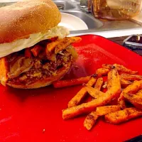 Quinoa burgers with beer caramelized onions, spicy sweet potato fries, and fried egg|Aubree Penneyさん