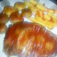 last nights dinner...rib-eye steak cooked blue just the way i like it with some fried mushromms and chips (fries)|Jakki Keithさん