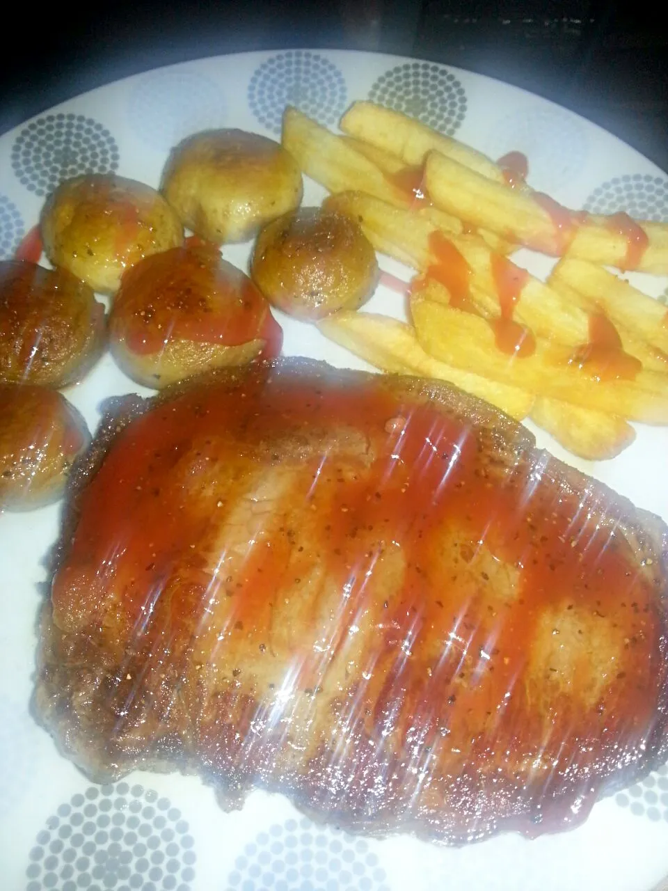 last nights dinner...rib-eye steak cooked blue just the way i like it with some fried mushromms and chips (fries)|Jakki Keithさん