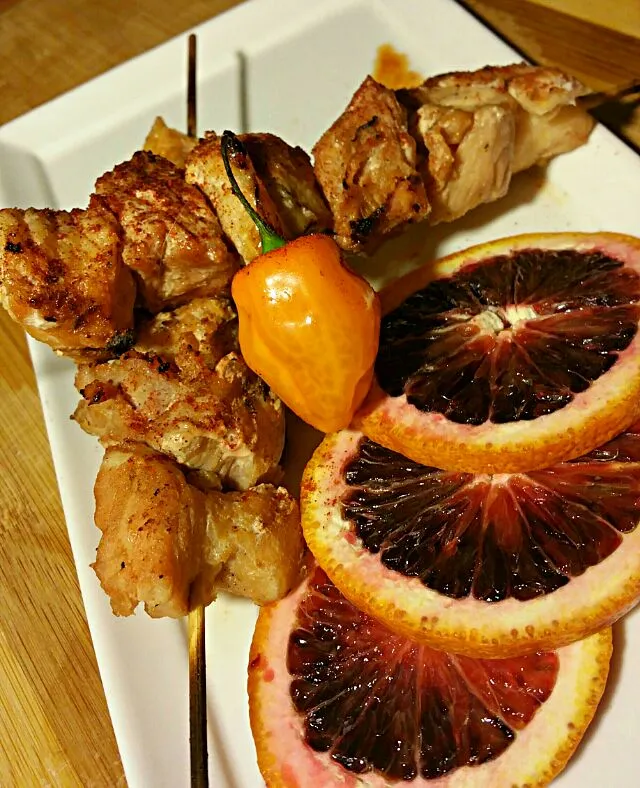 Grilled Alligator Kabobs with a Blood Orange, Mango, Cayenne, Habanero, Garlic, Brown Sugar, Red Trolley Ale Marinade. 

I don't really know what to call this d|Robert Schneiderさん