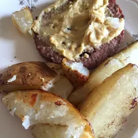 Snapdishの料理写真:Hamburger patty with hummus and roasted potato wedges|Ericaさん