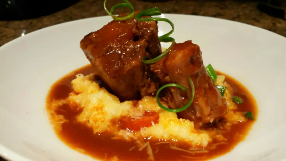 Coda alla Vaccinara, or oxtail stew, with creamy parmesan polenta,  finished with a reduction of the jus. .deep flavor,  SO good!|Stacy Dowさん