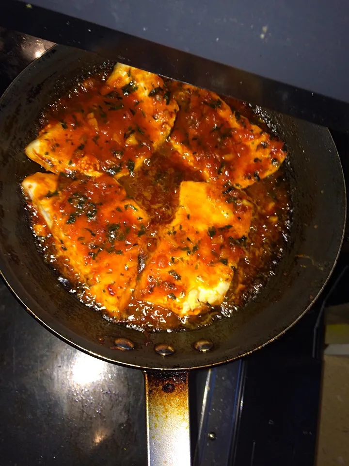 Swordfish in tomato marinate butter sauce|aida arafatさん