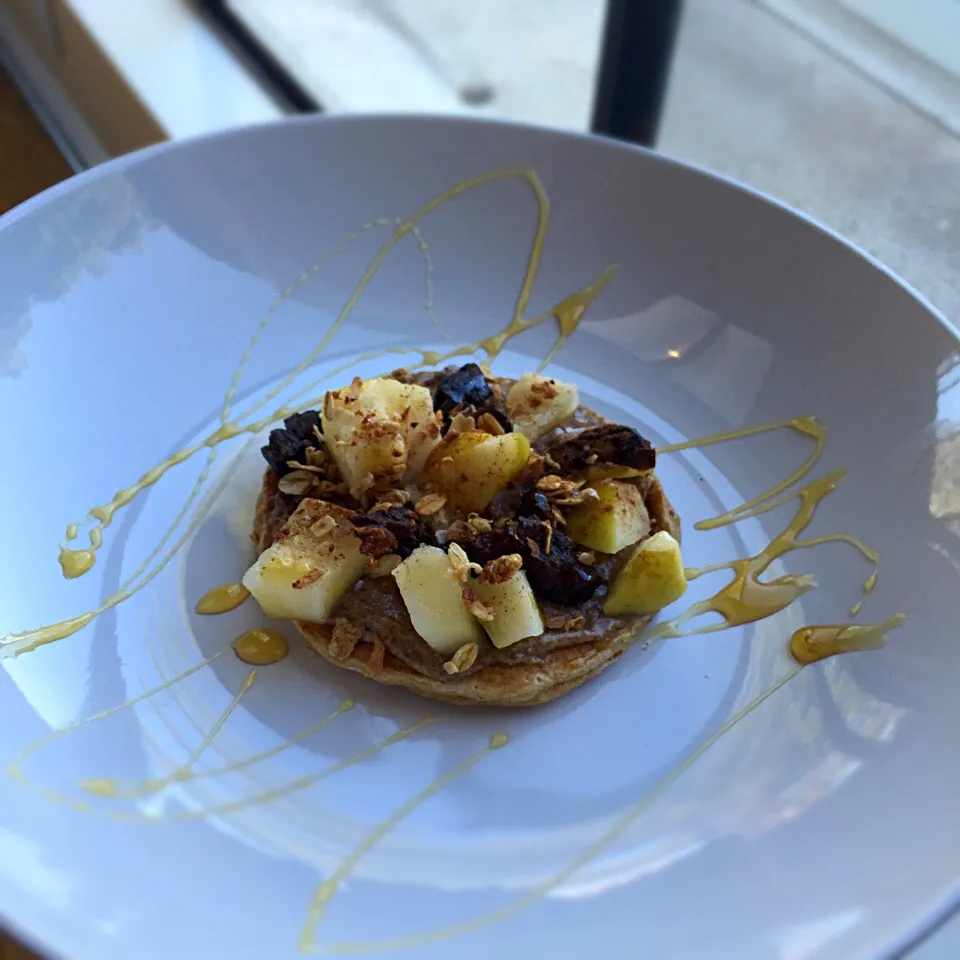 Whole wheat pancakes with almond butter spread, apples, prunes, cinnamon granola and honey|victoria valerioさん