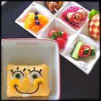 Snapdishの料理写真:Kid's lunch # Sushi wrapped in omelette 置きランチ  スポンジボブの茶巾寿司