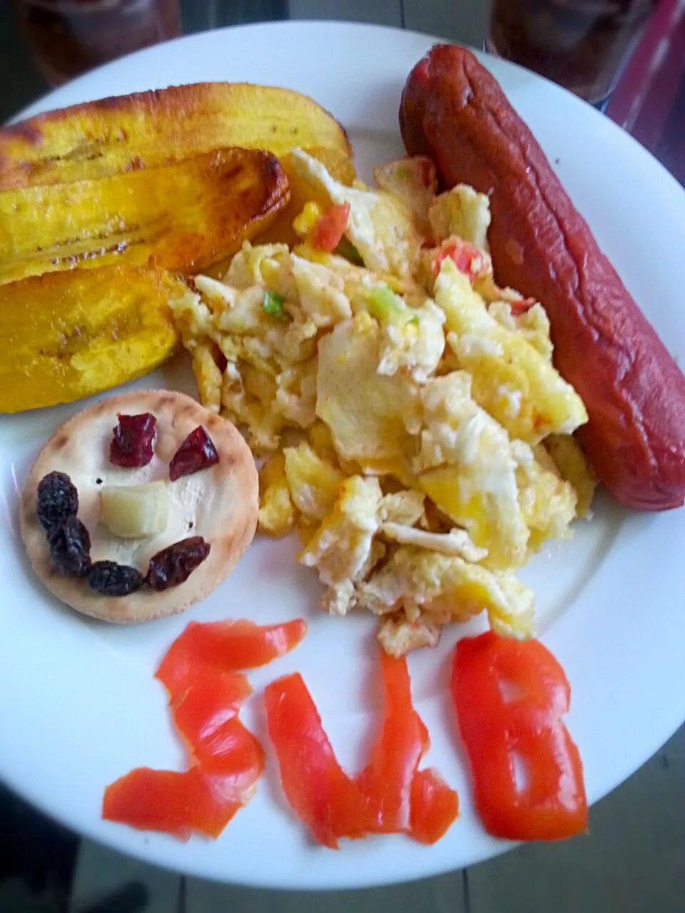 Snapdishの料理写真:plantain, scrambled eggs, sasauge and crackers|Alicia Kimaliさん