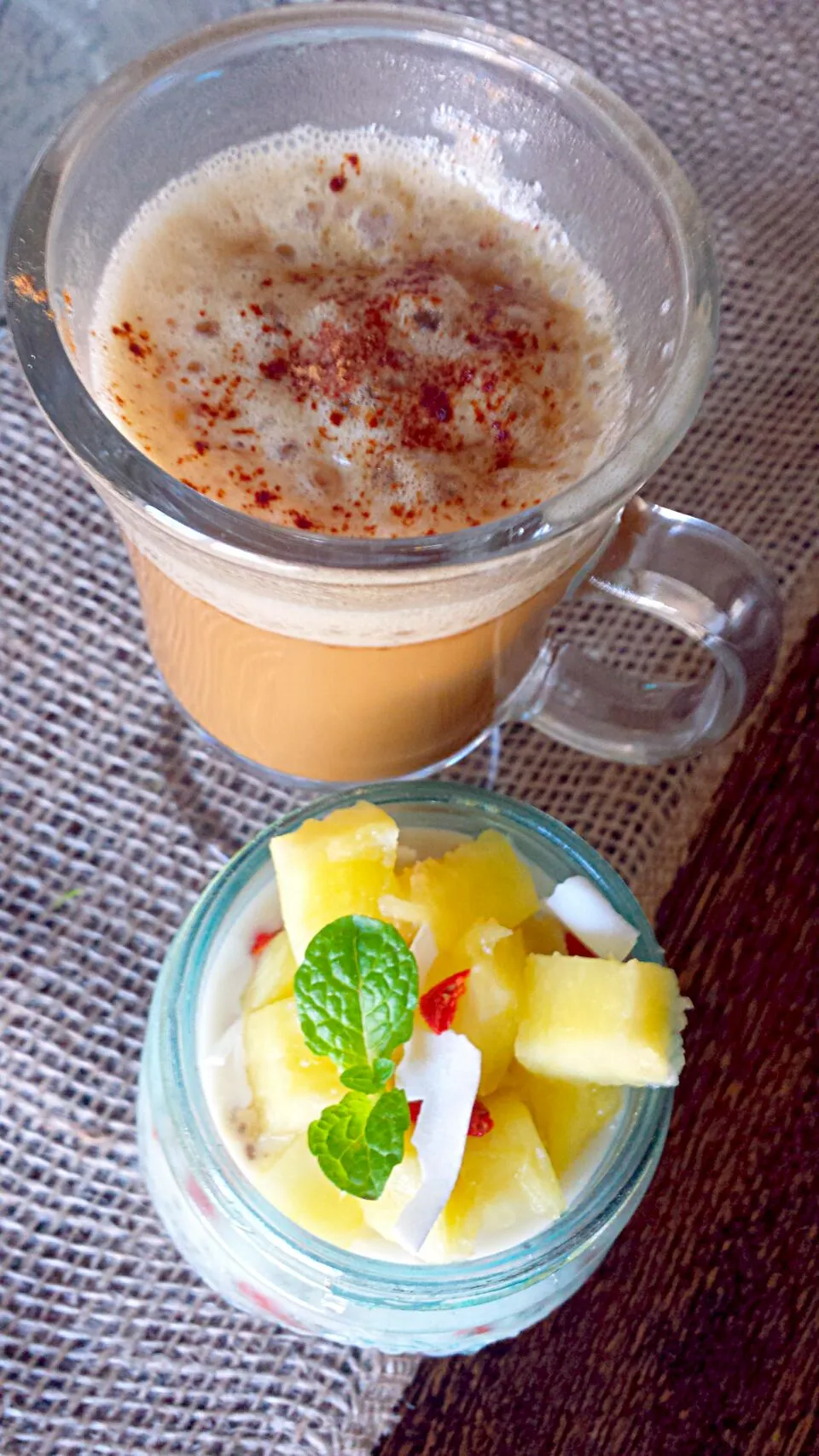 Snapdishの料理写真:Top view: breakfast indulgence: Goji berry,Pineapple and Coconut Chia Pudding with a glass of coffee with coconut oil and cinnamon.  Buy Fair Trade Organic coff|lisaさん