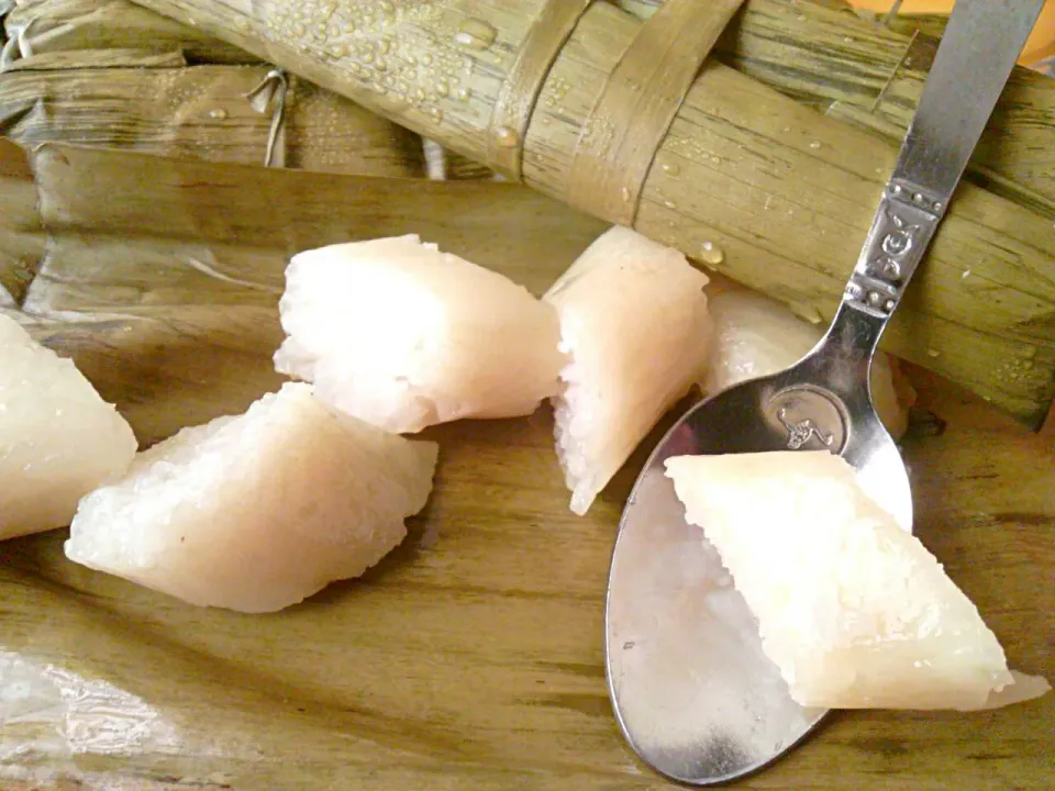 Snapdishの料理写真:Suman Snacks (sticky rice wrapped in banana leaf)|🌼 Pooja's Kitchenette 🌼さん