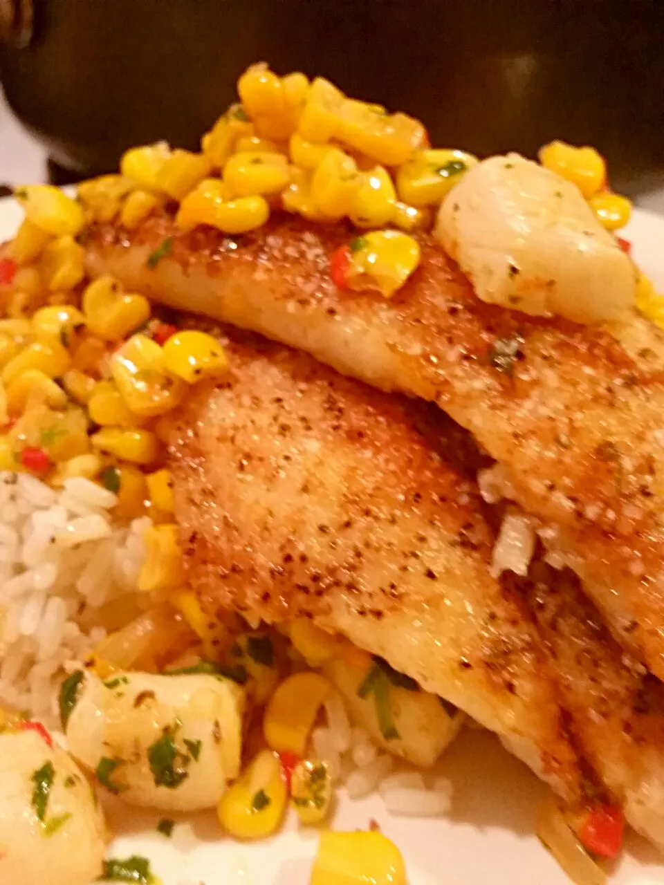 Grilled Swai over Rice Topped with Grilled Corn and Scallops, Peppers and Onions|Crystal Carltonさん