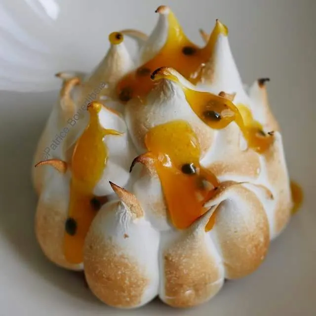 Snapdishの料理写真:Meringue covered mango ice cream topped with passionfruit syrup|CHUENCHAIさん