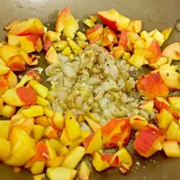 Shallots, fresh ginger, and peach reduction in the works|Amber Keyserさん