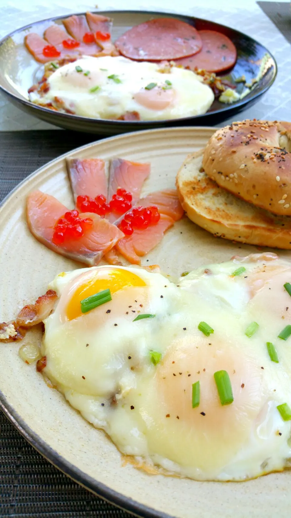 My kind of breakfast .. sunny side eggs stuff with bacon, onion, chilli and top with cheese.  follow by salted salmon with caviar and tossed bagel. Happy Monday|Mathura Sadovskyさん