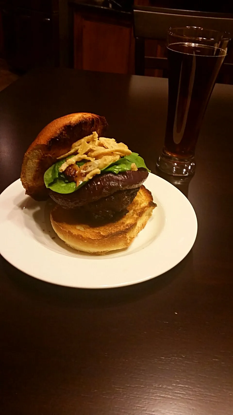 The Shiloh burger; 1/2 pound ground beef stuffed with Colby jack cheese, covered with grilled onions and mushrooms, spinach leaves, shaved garlic and fried onio|Nix & Snacksさん