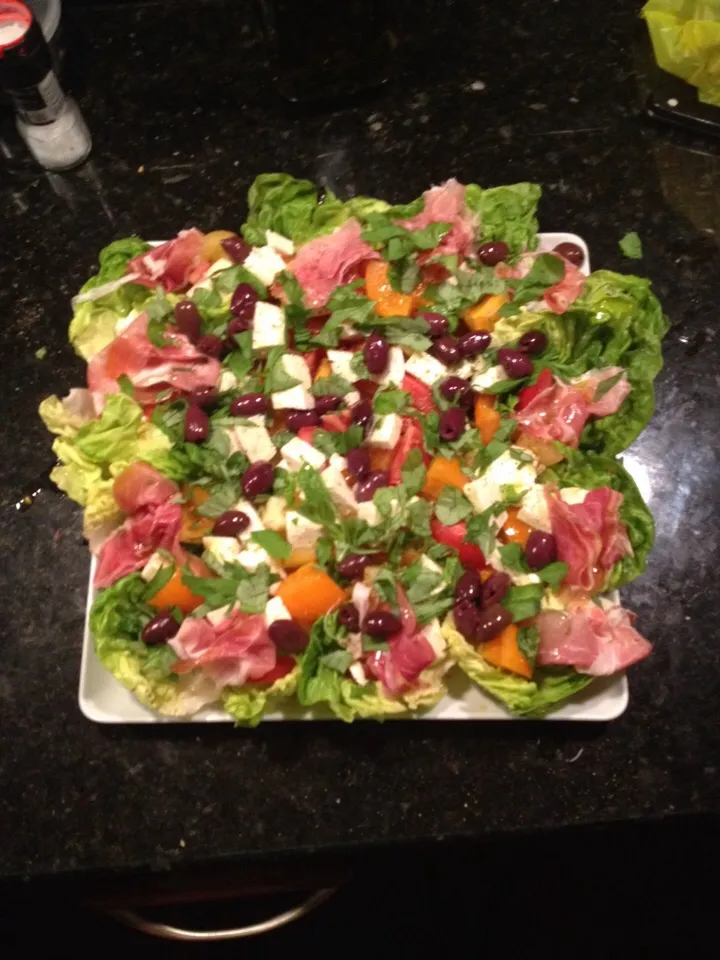 Insalata Caprese with prosciutto di Parma on Boston lettuce.|ernest ristiさん