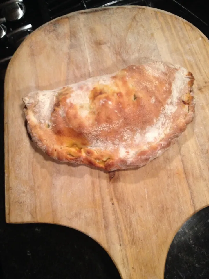 Calzone filled with broccoli rabe, sausage, and ricotta|ernest ristiさん