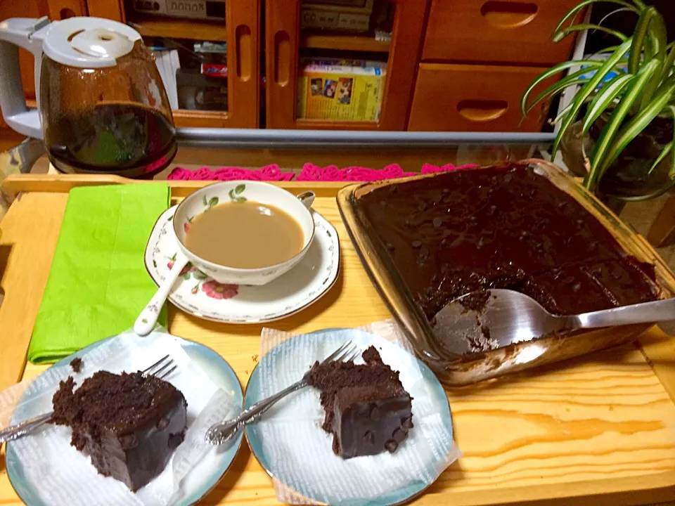 Snapdishの料理写真:Wacky crazy chocolate cake no butter no egg no bowl but it's really yummy 😋😋😋☕️✨👍 relaxing time while watching tv after taking a bath happiness ~~~|Babyluv Cabrera Ocampoさん