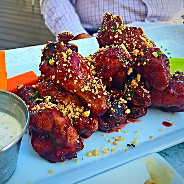 PB&J wings,topped with blackberry coulis and chopped peanuts|CHUENCHAIさん