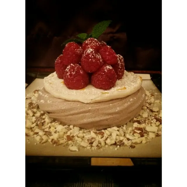 Snapdishの料理写真:Chocolate Pavlova with whipped cream, rasberries and almonds|Chef Butterflyさん