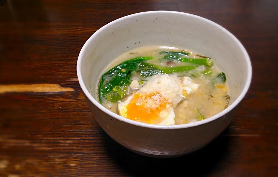 朝ごはん 菜花と玉子の大麦もちきび雑炊味噌バター仕立|ぽんたさん