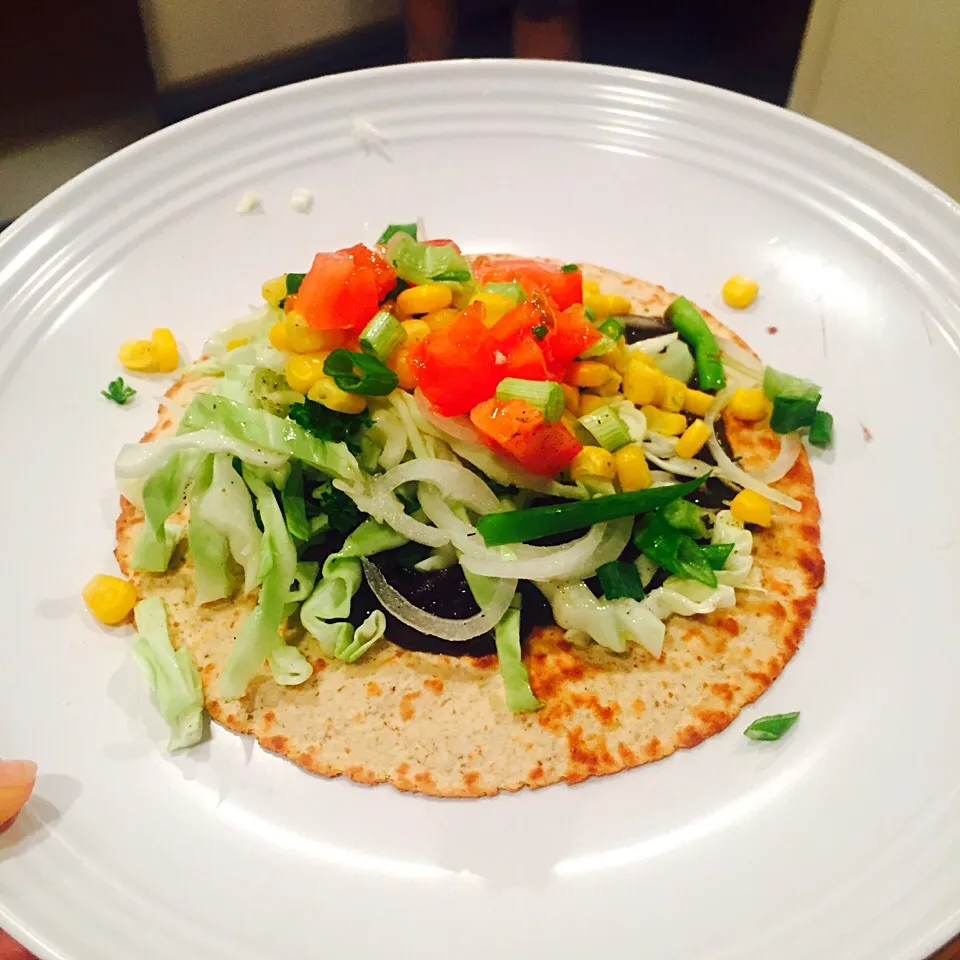 Whole wheat tortilla with black beans, corn, cabbage, tomato and onion|victoria valerioさん