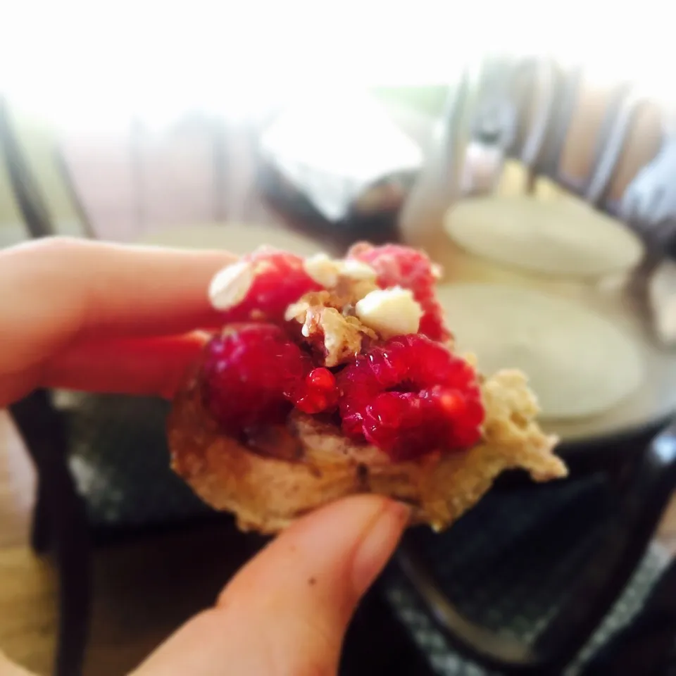 Snapdishの料理写真:Mini whole wheat organic waffles with almond butter, rassberries, granola and agave|victoria valerioさん