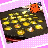 Snapdishの料理写真:たこ焼き器でアヒージョ|sonaさん