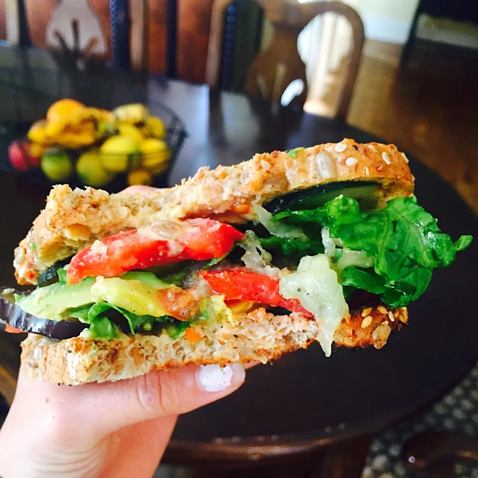 Grilled eggplant, cucumber, tomato, avocado, lettuce and homemade hummus sandwich on whole wheat sprout bread|victoria valerioさん