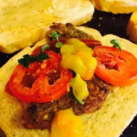 Snapdishの料理写真:Veggie Burger with fresh hummus, piccalilli, tomatoes, basil and lemon balm|kavita maharajさん