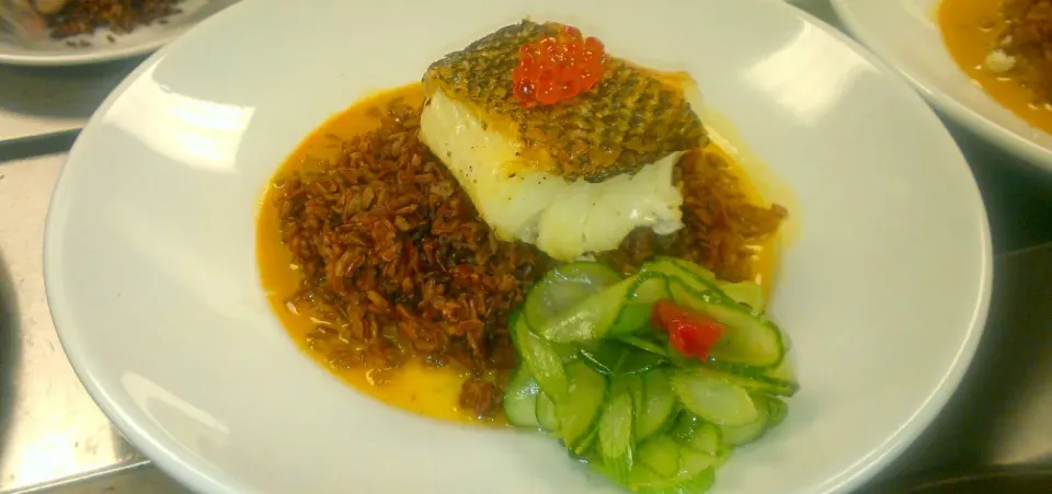 Snapdishの料理写真:Pan seared Nero sea bass,over himalayan red rice..topped with caviar and garnished with a shaved cucumber  slaw|chef Charlesさん