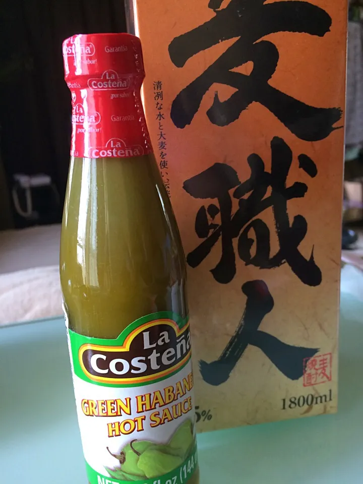 Sho chu and very hot green habanero sauce... Tonight's pasta|Nigelさん