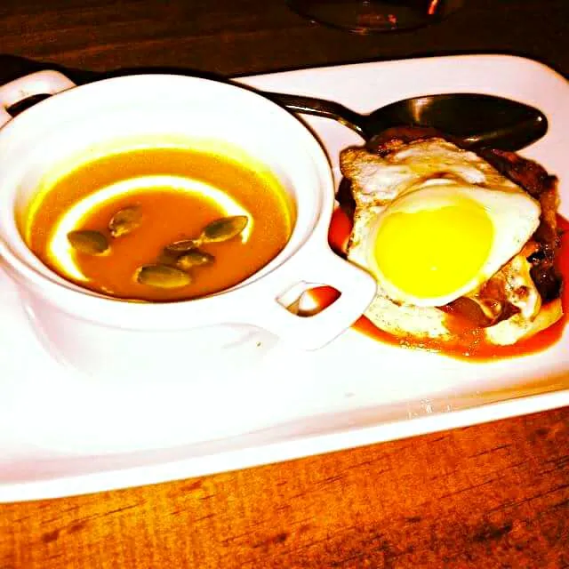 Butternut squash soup with pepitas, quail egg open face corned beef tongue topped with quail egg|CHUENCHAIさん