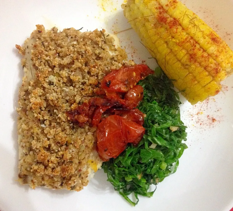 Snapdishの料理写真:Nut & parmesan crusted fish, collard greens, roasted tomatoes and corn|marcelabruggerさん