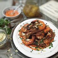 Grilled shrimps with pepper and lemon sauce,mint and almond