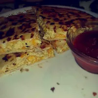 Grilled breakfast quesadilla. 
scrambled eggs, Cheddar chees, & homemade salsa.|Ashley Millerさん