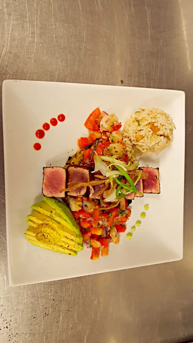 ah tuna,served over sweet shrimp ceviche..garnished with a grilled pineapple, cashew coconut jasmine rice and avocado....topped with garlic wasabi fried wonton|chef Charlesさん