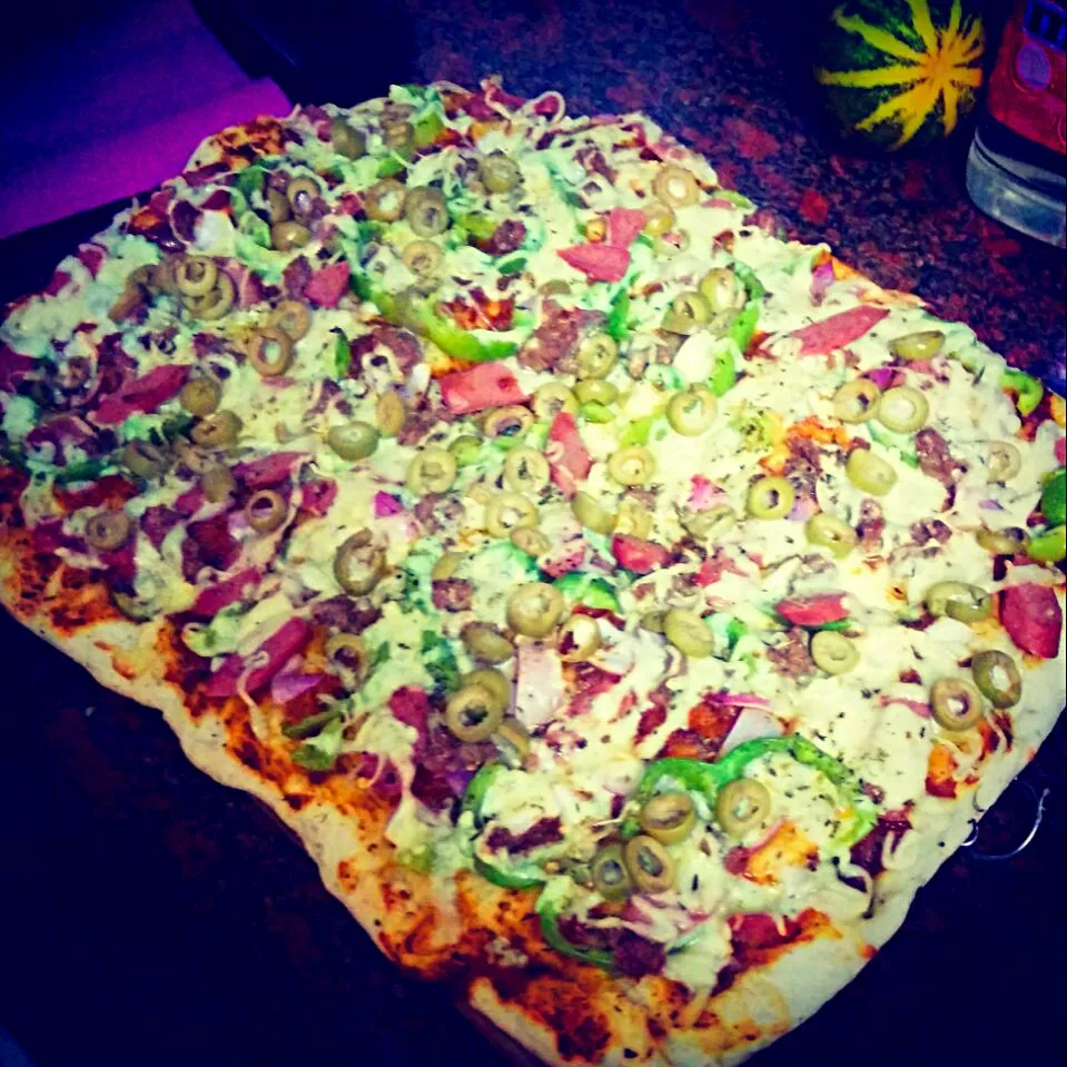 Overloaded pizza #sausages #ham #olives #somuchmeat #yummy #pizza|Alister Mendonzaさん