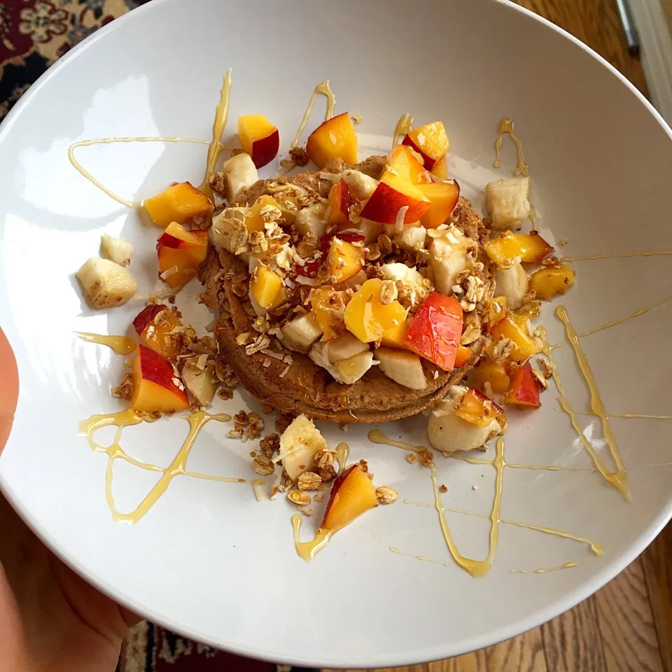 Whole wheat waffles with peanut butter, peaches, banana, granola and a drizzle of honey|victoria valerioさん