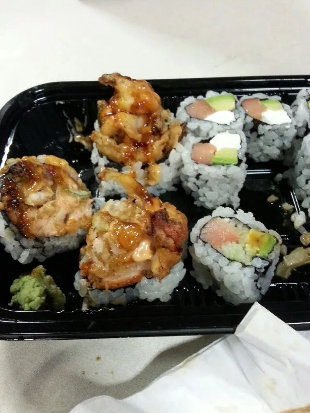 lunch at school with my son. his spicy seafood roll, Alaska roll, and phili roll.|Polly Gelfusoさん