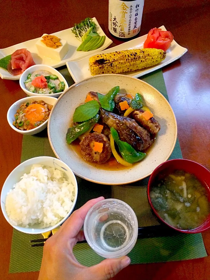 Snapdishの料理写真:Today's Dinner🍴前菜･焼もろこし･茄子のおからﾊﾝﾊﾞｰｸﾞ詰め煮･納豆&卵黄･大和芋,おくら&明太子･大根とﾜｶﾒのお味噌汁･白飯|🌈Ami🍻さん