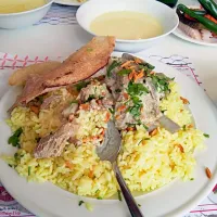 mansaf: Jordanian buttered rice with mutton chop, assorted nuts & herbs and sour yogurt|Sohaib Mehtabさん