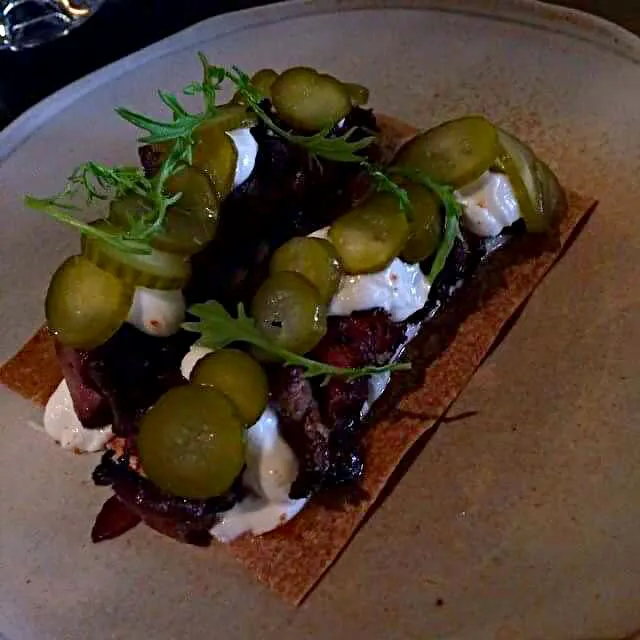 Housemade pastrami, goats curds and pickled cucumber|CHUENCHAIさん