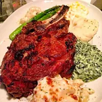 32oz medium rare wagyu beef (finest beef) with sides of cream corn, asparagus, lobster mac and cheese, mash and spinach and gnocchi.