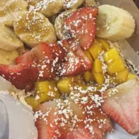 Snapdishの料理写真:Strawberry, mango, banana waffles|Malcolm Spaceleeさん