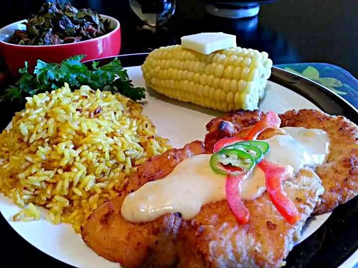 fried turkey cutlets ,yellow coconut rice,corn on the cob,collard greens|CHUENCHAIさん